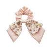 The floral double-layer bow hair tie is tied at the back of the female head with a ponytail band. It has a high level of appearance and is tied with a hair ribbon and a forest-style hair tie Item Picture